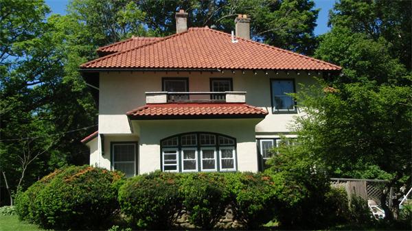110 Adin Street Hopedale, MA 01747 - Photo 5 of 7 a front view of a house with plants
