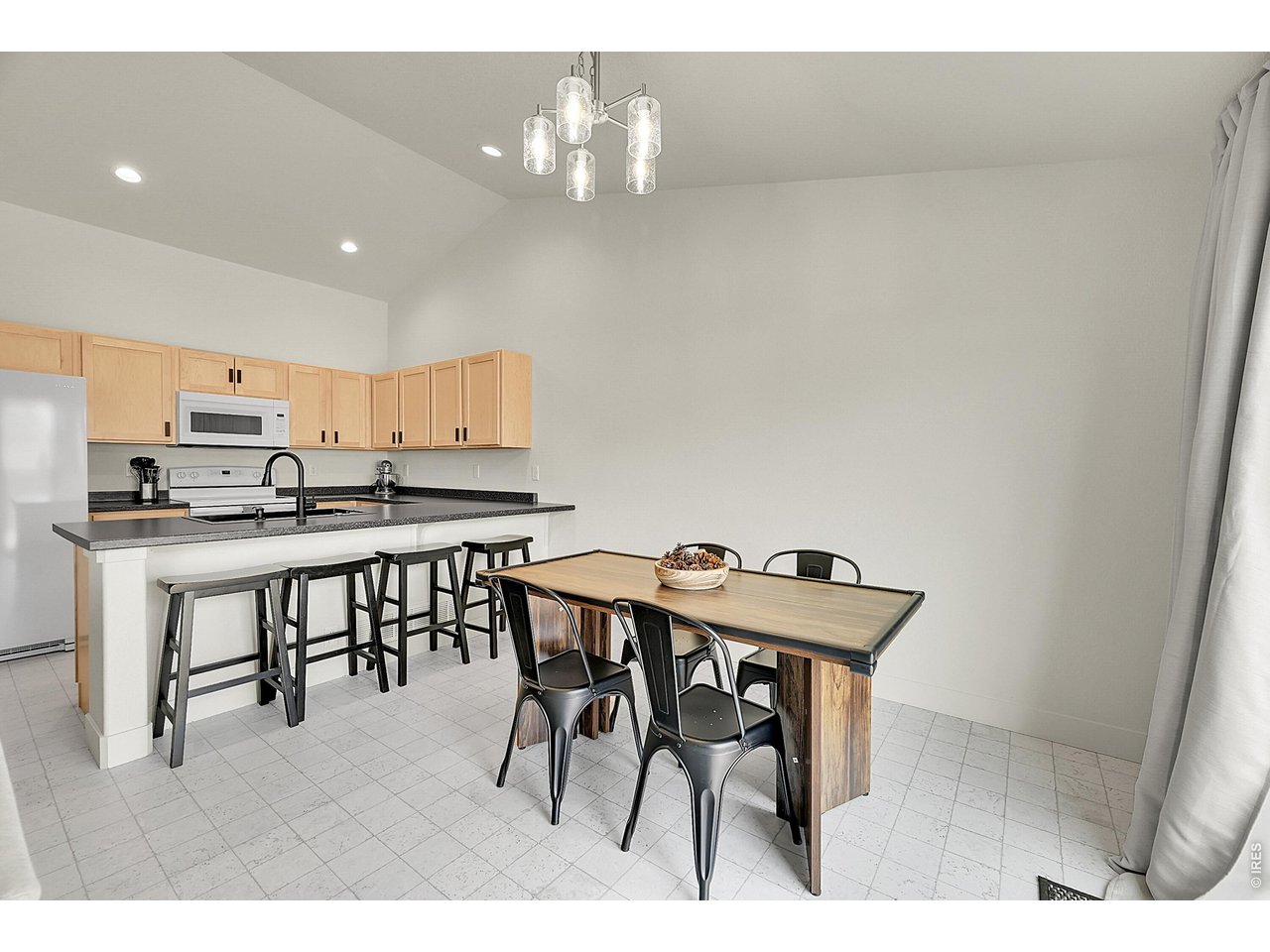 432 Halcyon Way Windsor, CO 80550 - Photo 13 of 40 Dining Area w/ New Light Fixture