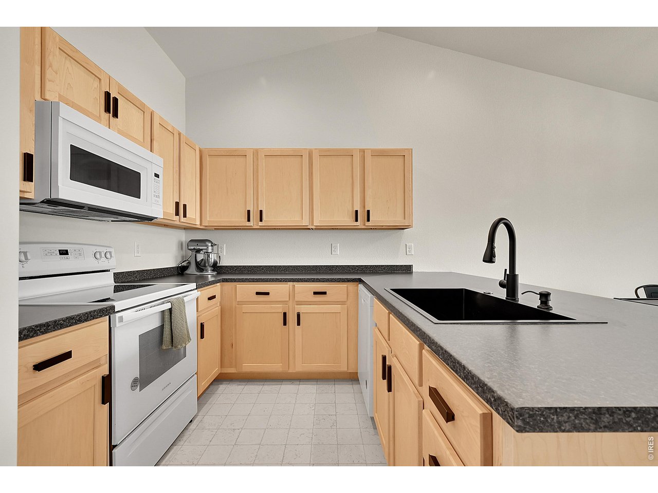 432 Halcyon Way Windsor, CO 80550 - Photo 9 of 40 Kitchen w/ Refrigerator, Electric Oven/Stove, Microwave and Dishwasher