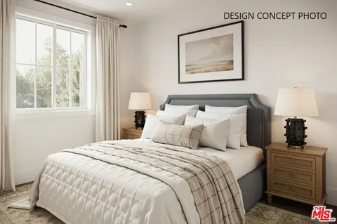 a bedroom with bed and a window