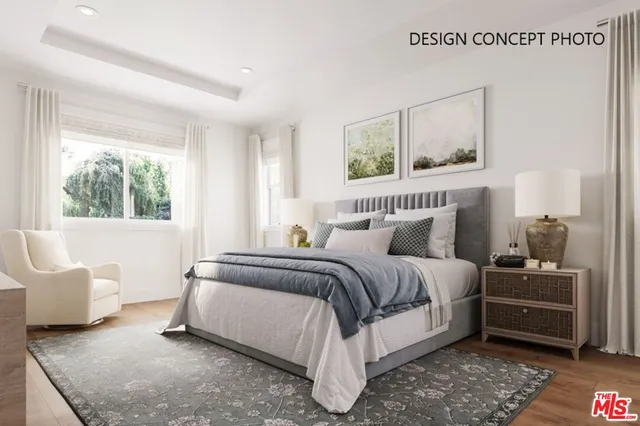 a bedroom with a bed and a couch