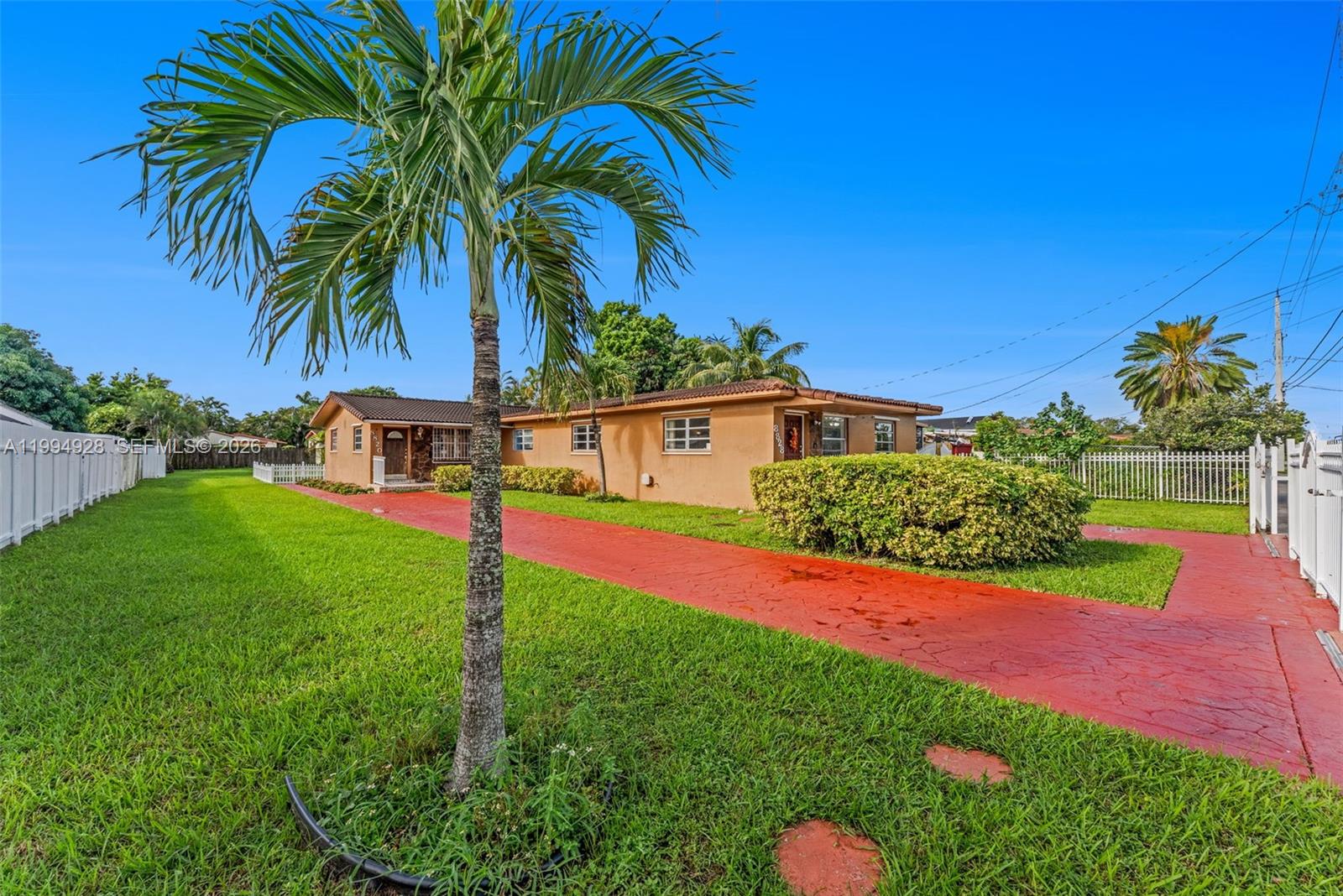 a front view of a house with yard