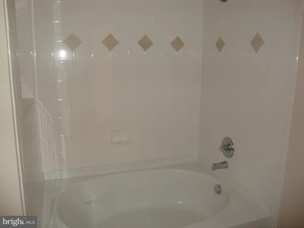 a close up of a bathtub