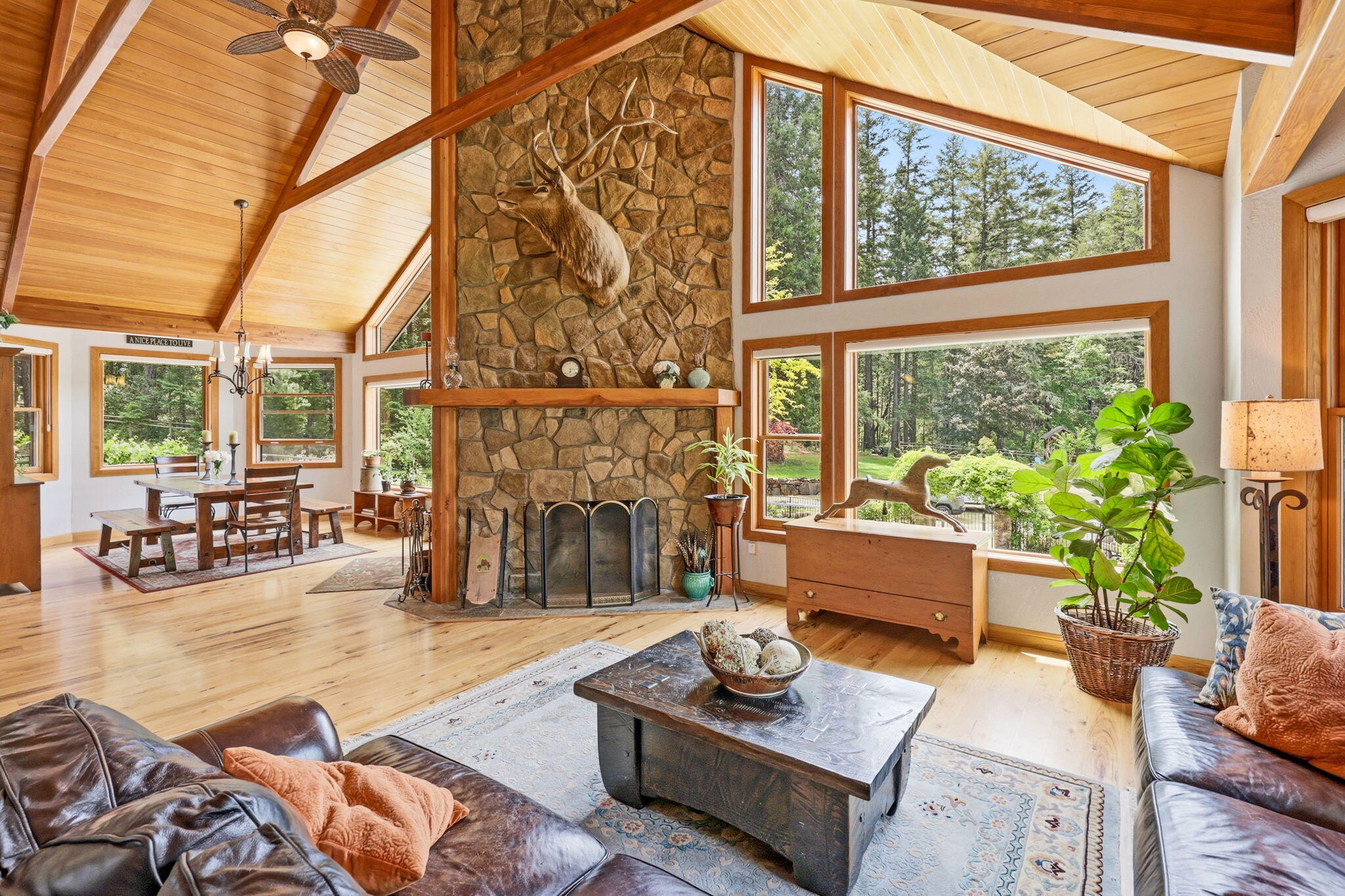 985 Elliott Creek Road Wilderville, OR 97543 - Photo 10 of 98 a living room with furniture and a large window
