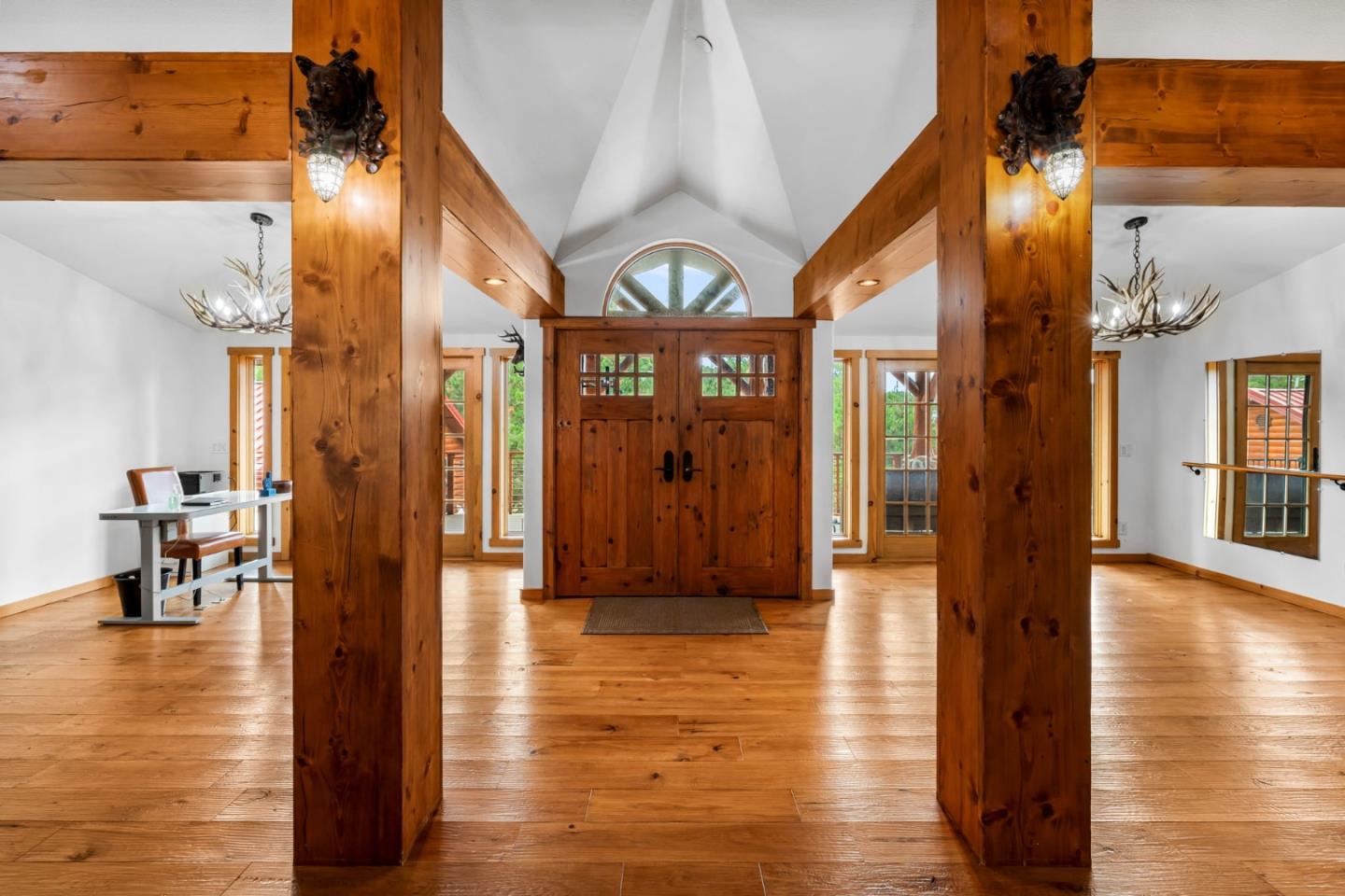 8697 Dyer Road Salinas, CA 93907 - Photo 13 of 94 a view of a hallway with wooden floor windows and a bathroom