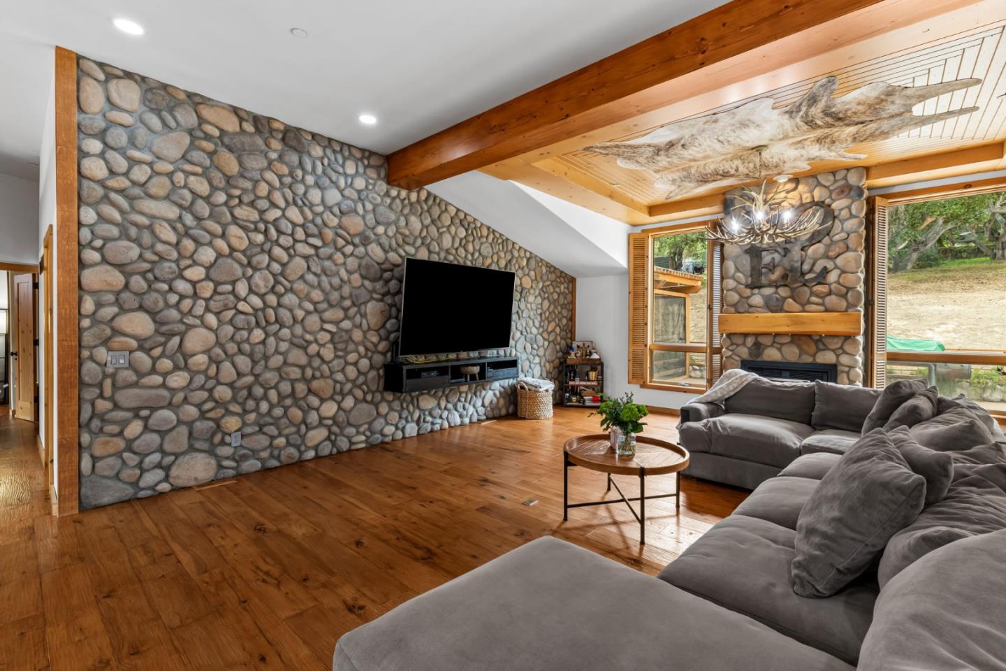 8697 Dyer Road Salinas, CA 93907 - Photo 14 of 94 a living room with furniture and a flat screen tv