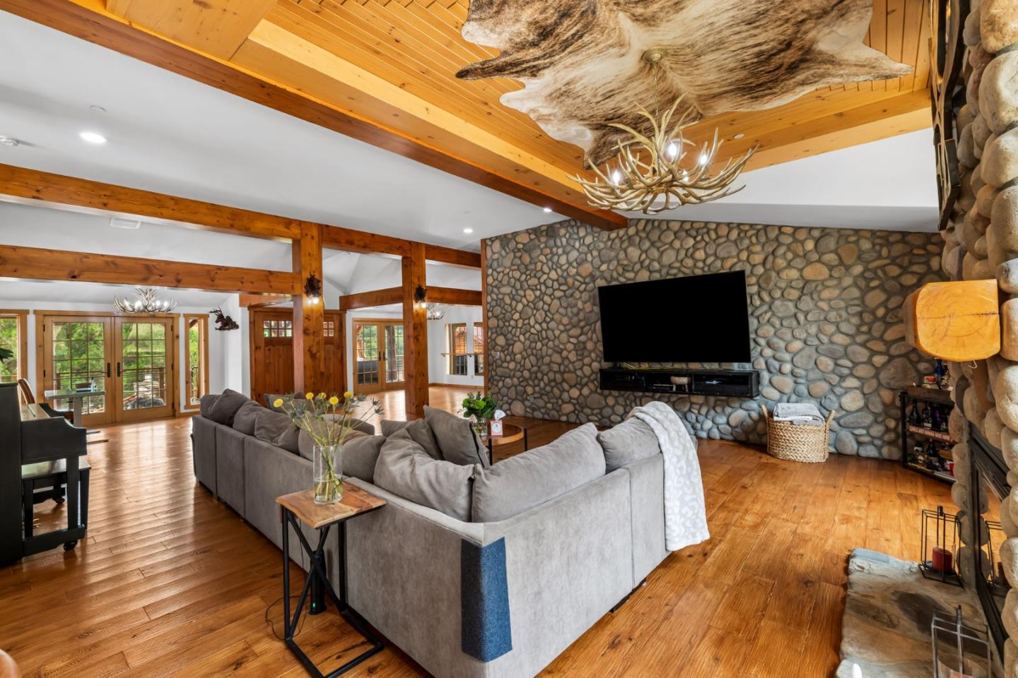 8697 Dyer Road Salinas, CA 93907 - Photo 18 of 94 a living room with furniture and a flat screen tv