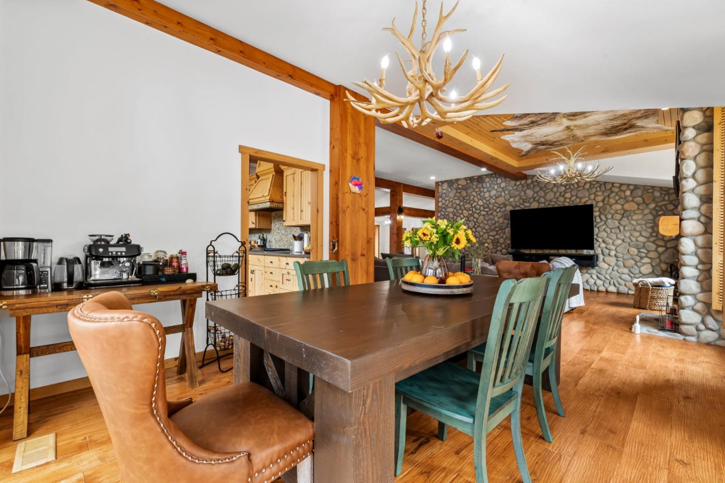 8697 Dyer Road Salinas, CA 93907 - Photo 22 of 94 a view of a dining room with furniture and a flat screen tv