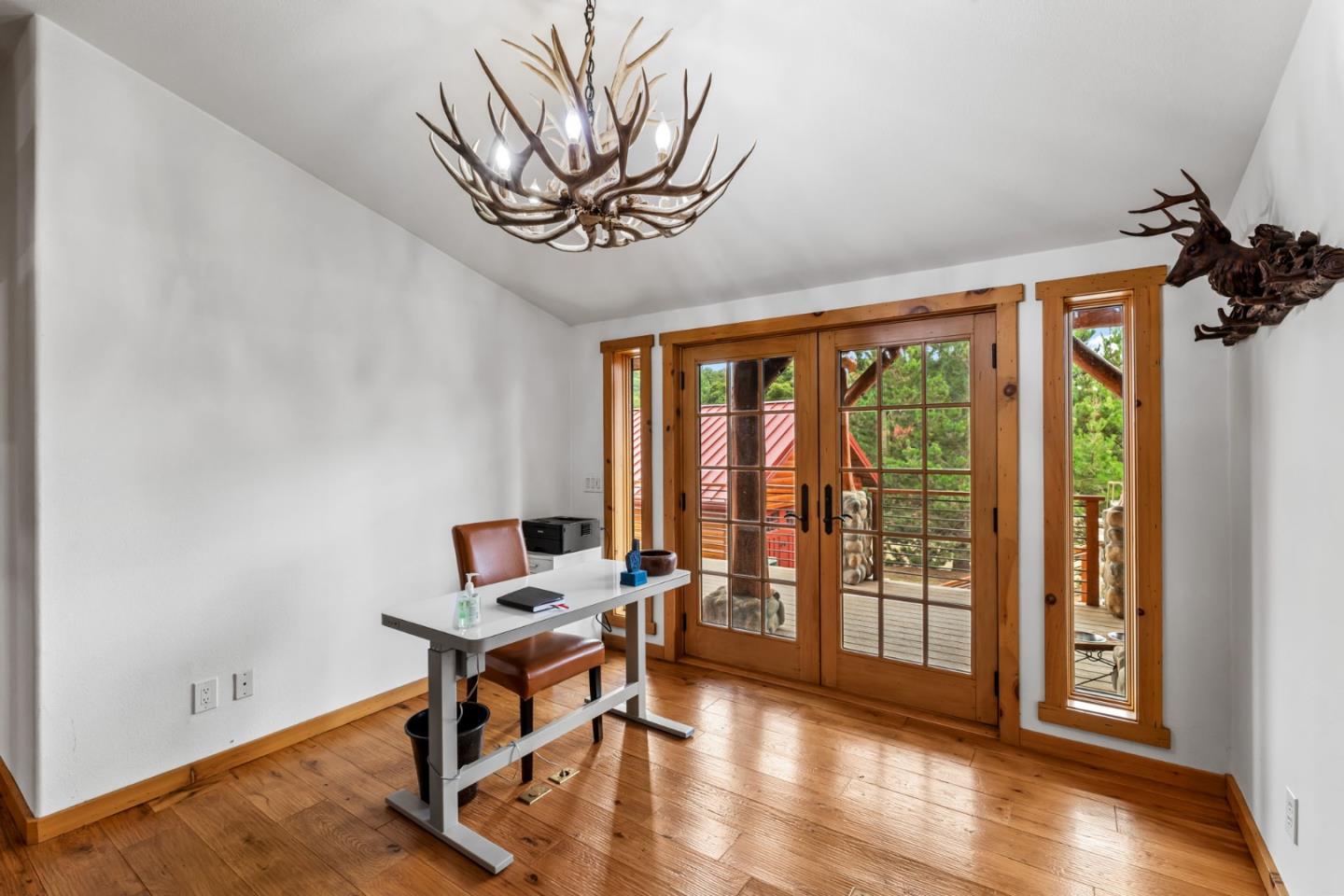 8697 Dyer Road Salinas, CA 93907 - Photo 28 of 94 a workspace with furniture window and wooden floor