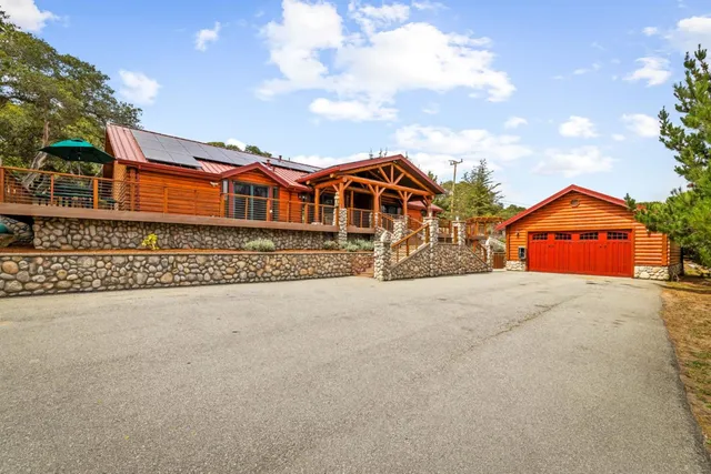 a front view of a house with a outdoor space