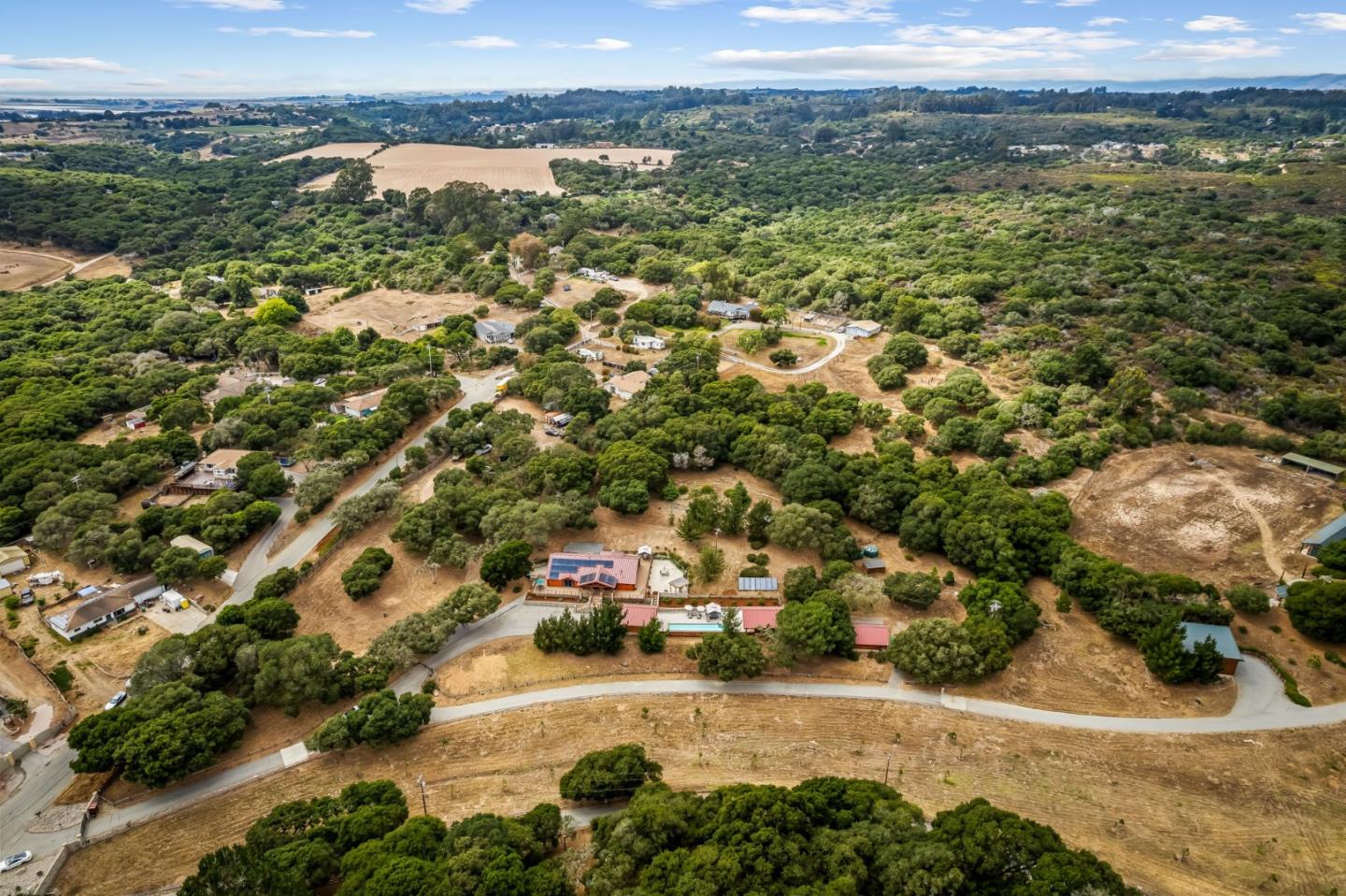 8697 Dyer Road Salinas, CA 93907 - Photo 82 of 94 an aerial view of residential houses with outdoor space and trees