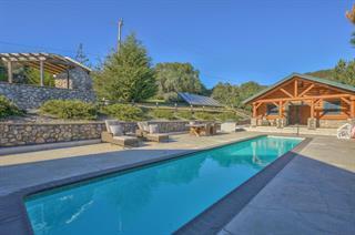 8697 Dyer Road Salinas, CA 93907 - Photo 84 of 94 a view of a house with a yard and sitting area