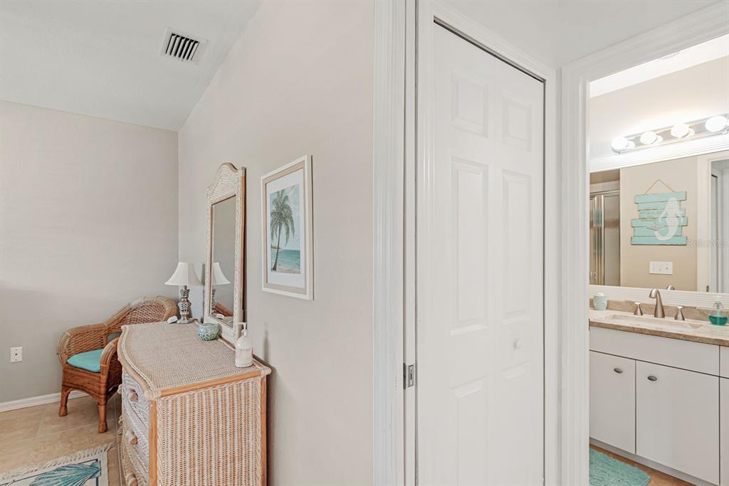 4260 Placida Road, Unit 12C Englewood, FL 34224 - Photo 28 of 57 a bathroom with a sink and a mirror