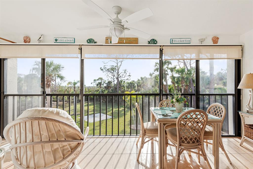 4260 Placida Road, Unit 12C Englewood, FL 34224 - Photo 34 of 57 a view of a balcony with furniture