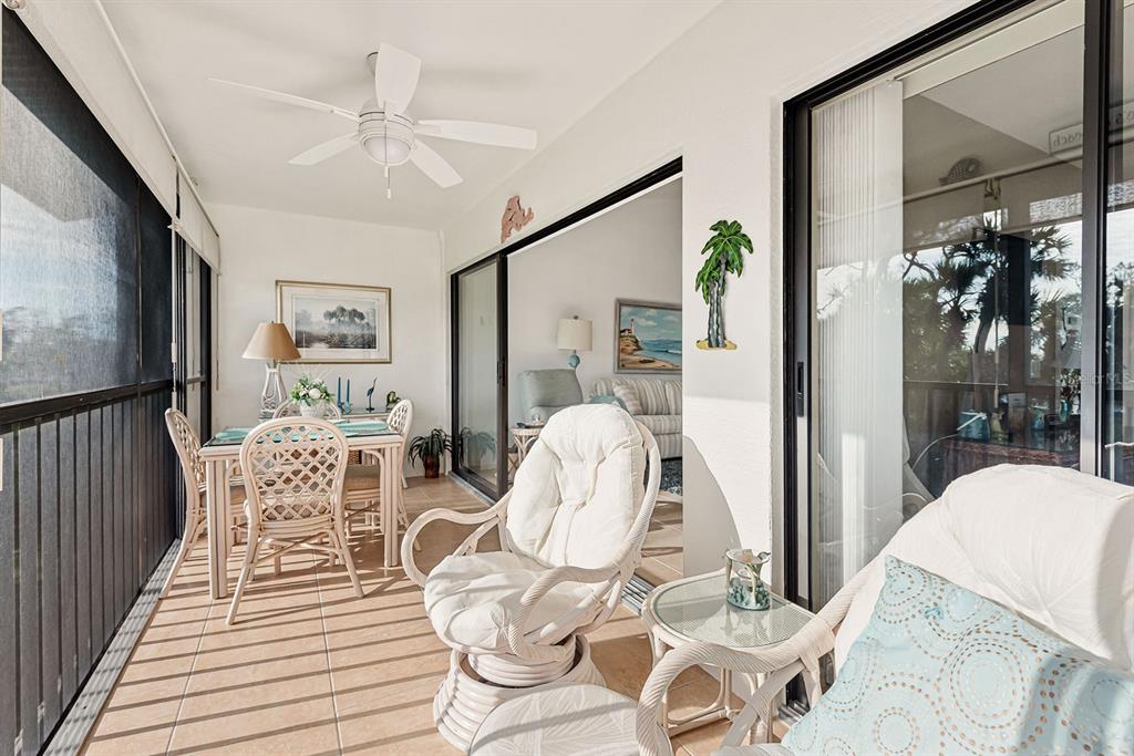 4260 Placida Road, Unit 12C Englewood, FL 34224 - Photo 36 of 57 a view of a livingroom with furniture and wooden floor