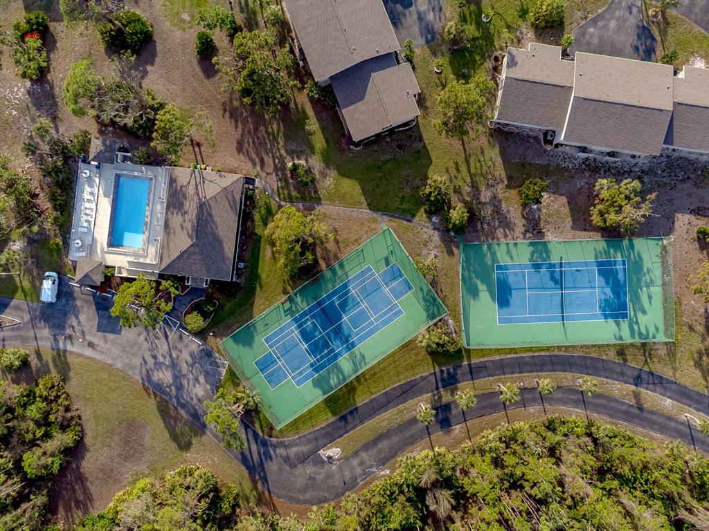 4260 Placida Road, Unit 12C Englewood, FL 34224 - Photo 43 of 57 an aerial view of a house with a yard