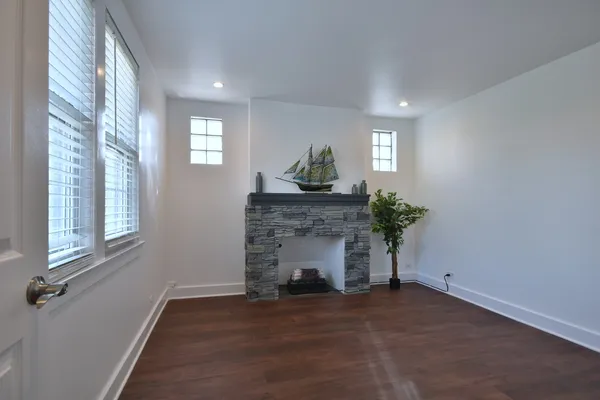 an empty room with a bathroom