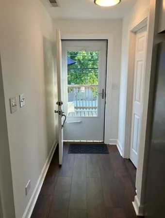 a view of balcony with furniture