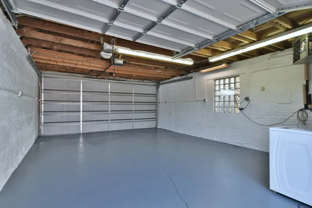a view of a room with wooden walls