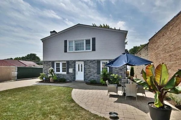 a house view with a garden space