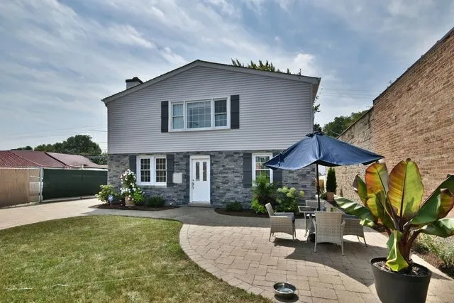 a house view with a garden space