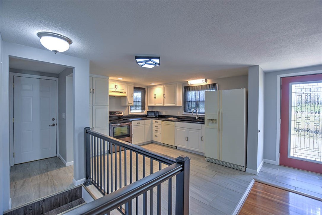 3970 Mount Zion Road Decatur, IL 62521 - Photo 12 of 36 a view of a kitchen from the hallway