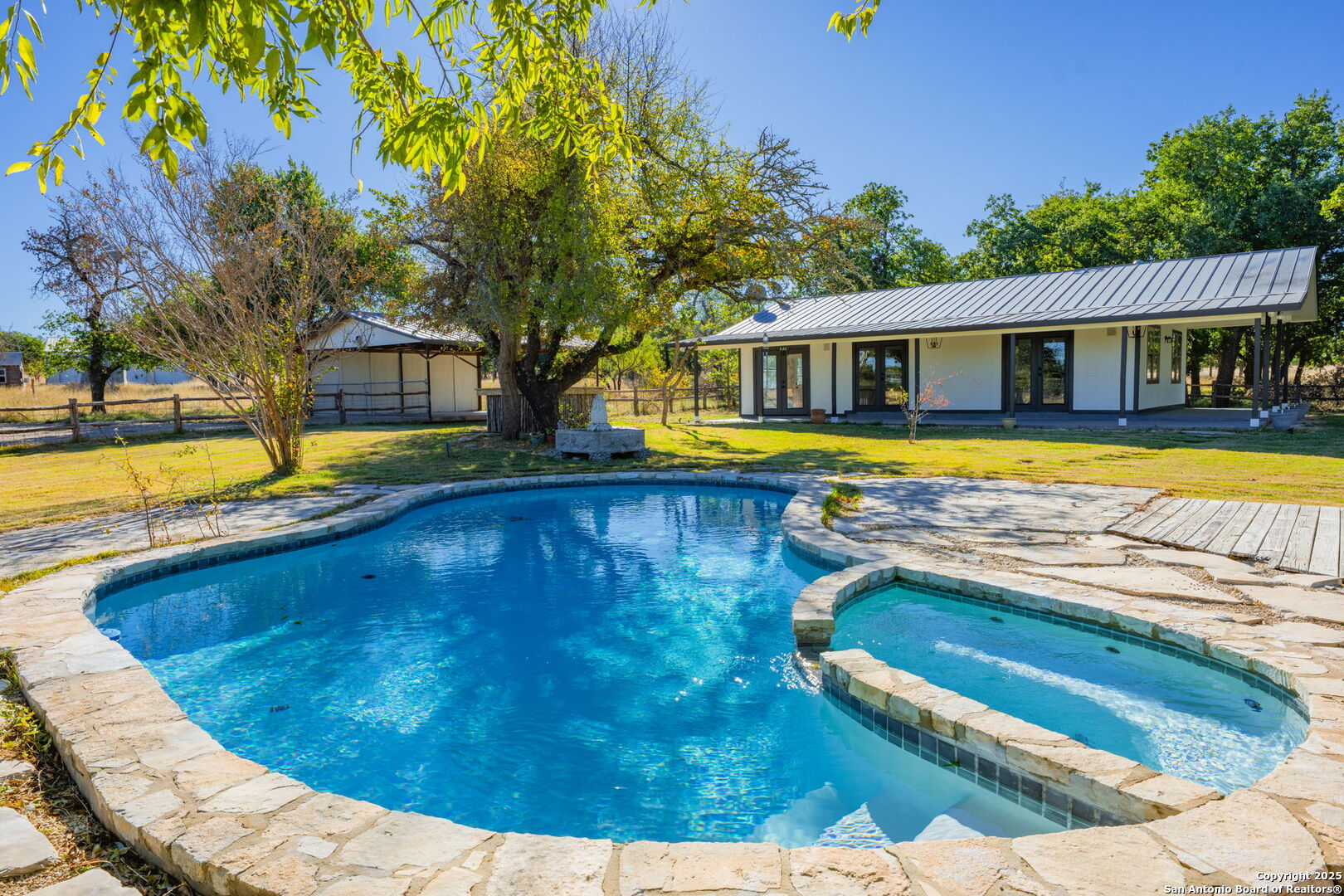 28 Ruger Road Fredericksburg, TX 78624 - Photo 16 of 46 a view of a house with swimming pool