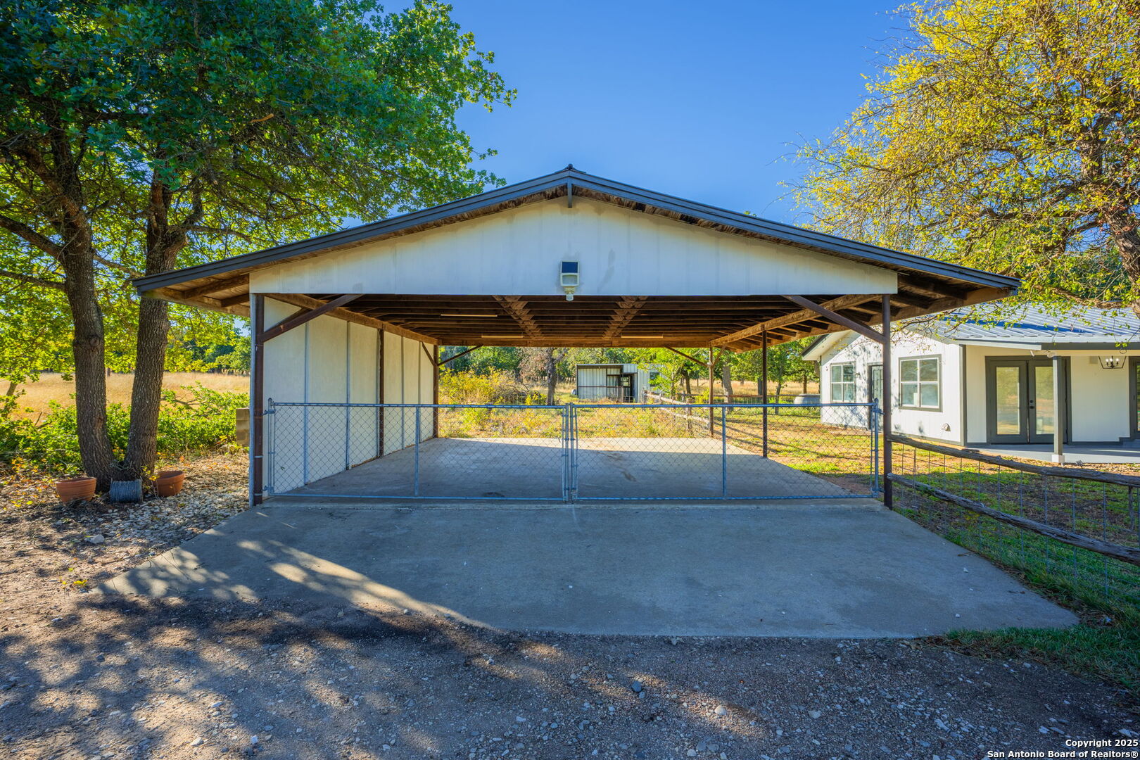 28 Ruger Road Fredericksburg, TX 78624 - Photo 17 of 46 a view of an house with backyard and balcony