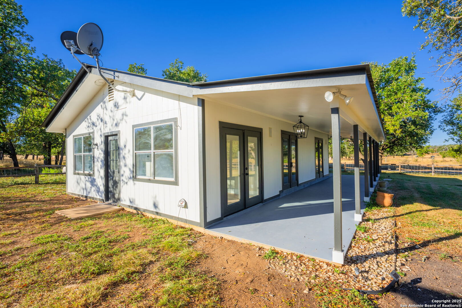 28 Ruger Road Fredericksburg, TX 78624 - Photo 3 of 46 a view of a house with backyard and sitting area