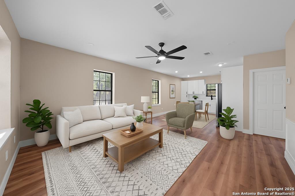 28 Ruger Road Fredericksburg, TX 78624 - Photo 31 of 46 a living room with furniture potted plant and a window
