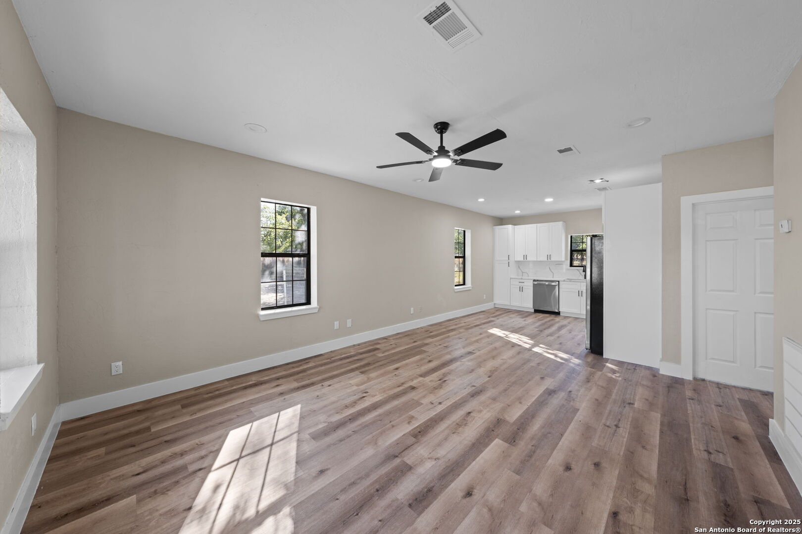 28 Ruger Road Fredericksburg, TX 78624 - Photo 32 of 46 a view of empty room with wooden floor and fan
