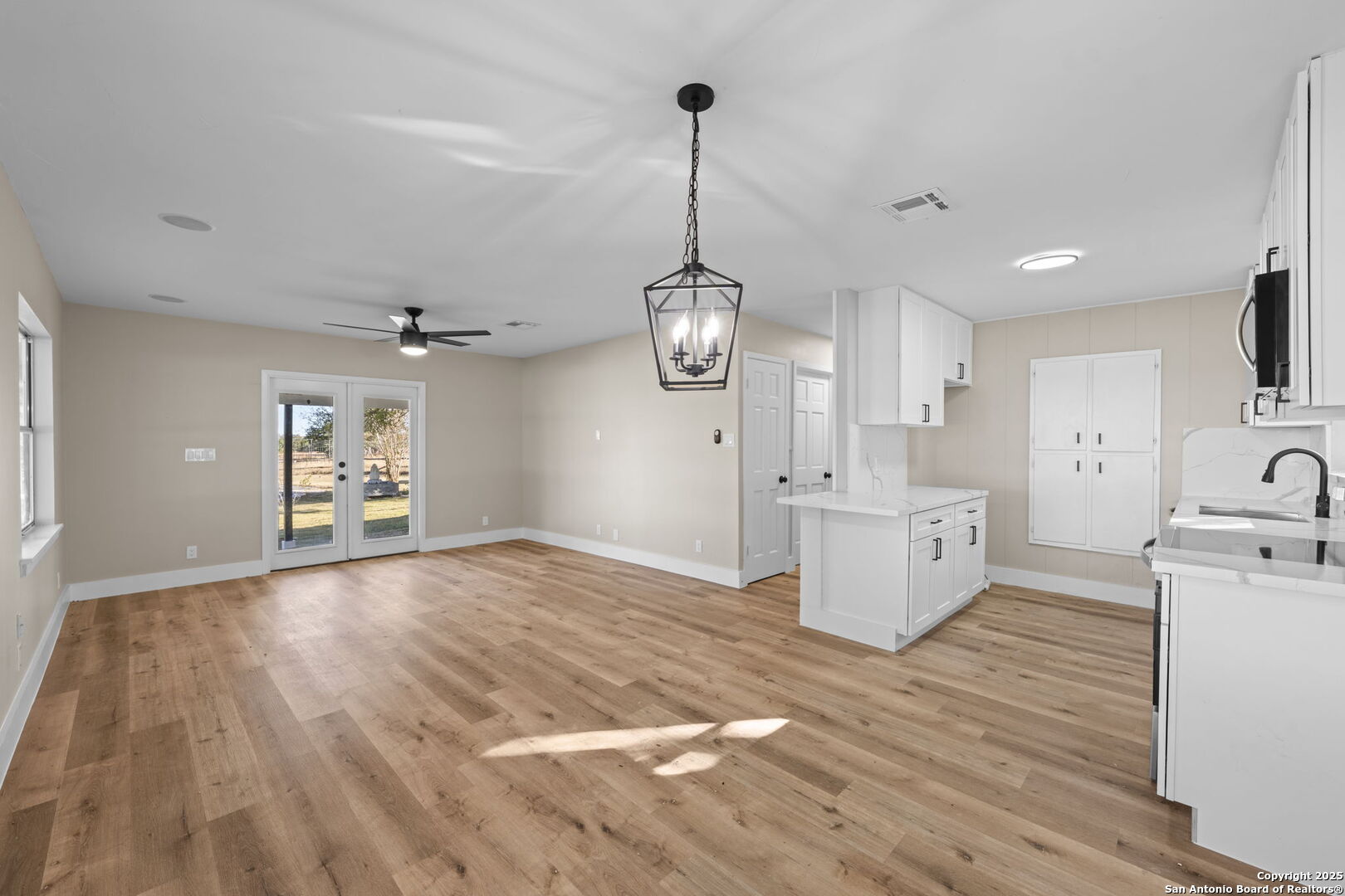 28 Ruger Road Fredericksburg, TX 78624 - Photo 6 of 46 a view of a kitchen center island and wooden floor