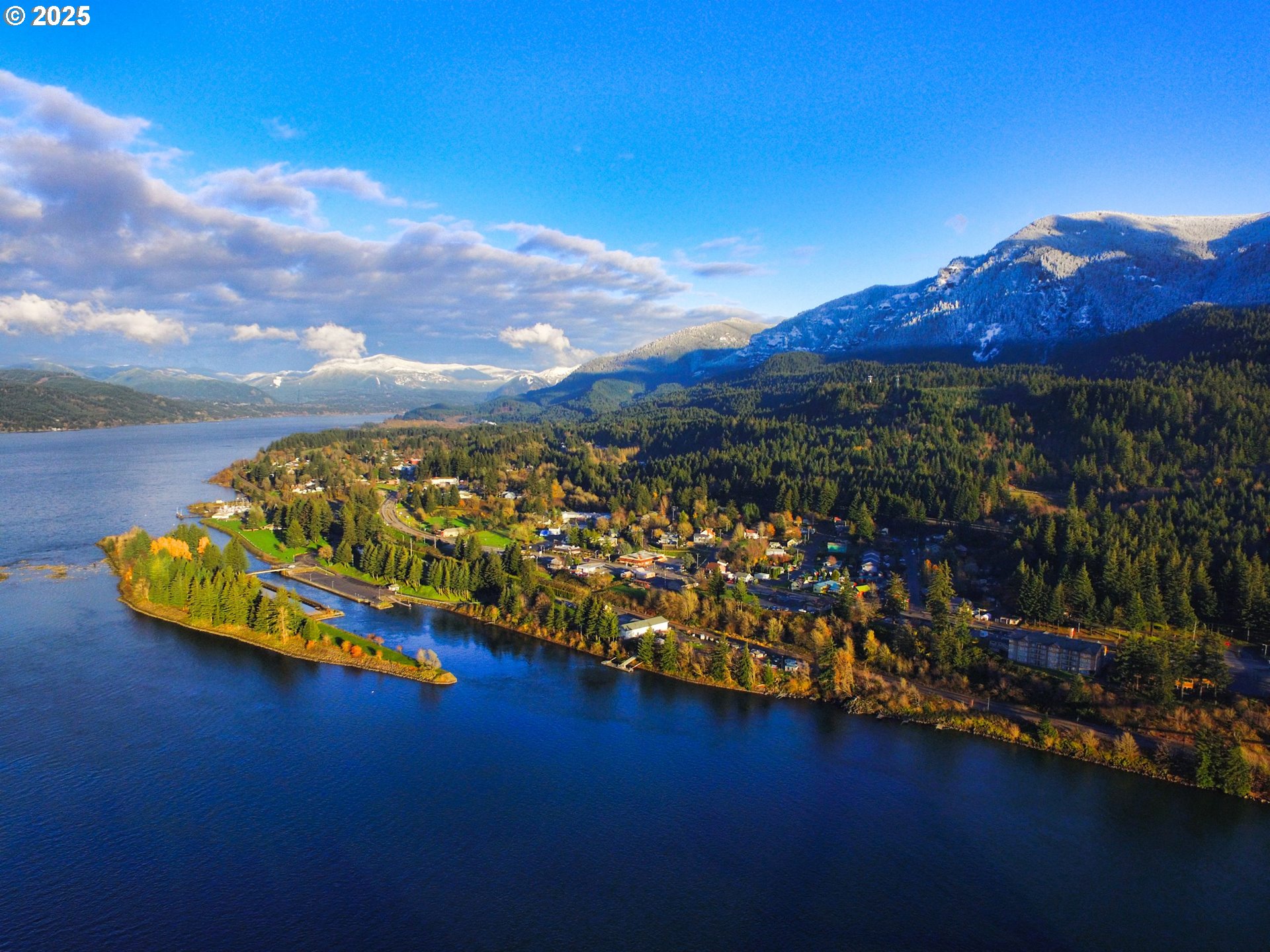 225 Sternwheeler Drive Cascade Locks, OR 97014 - Photo 6 of 8 a view of a fire pit with an ocean