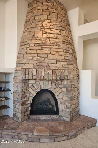 a view of entryway with a fireplace