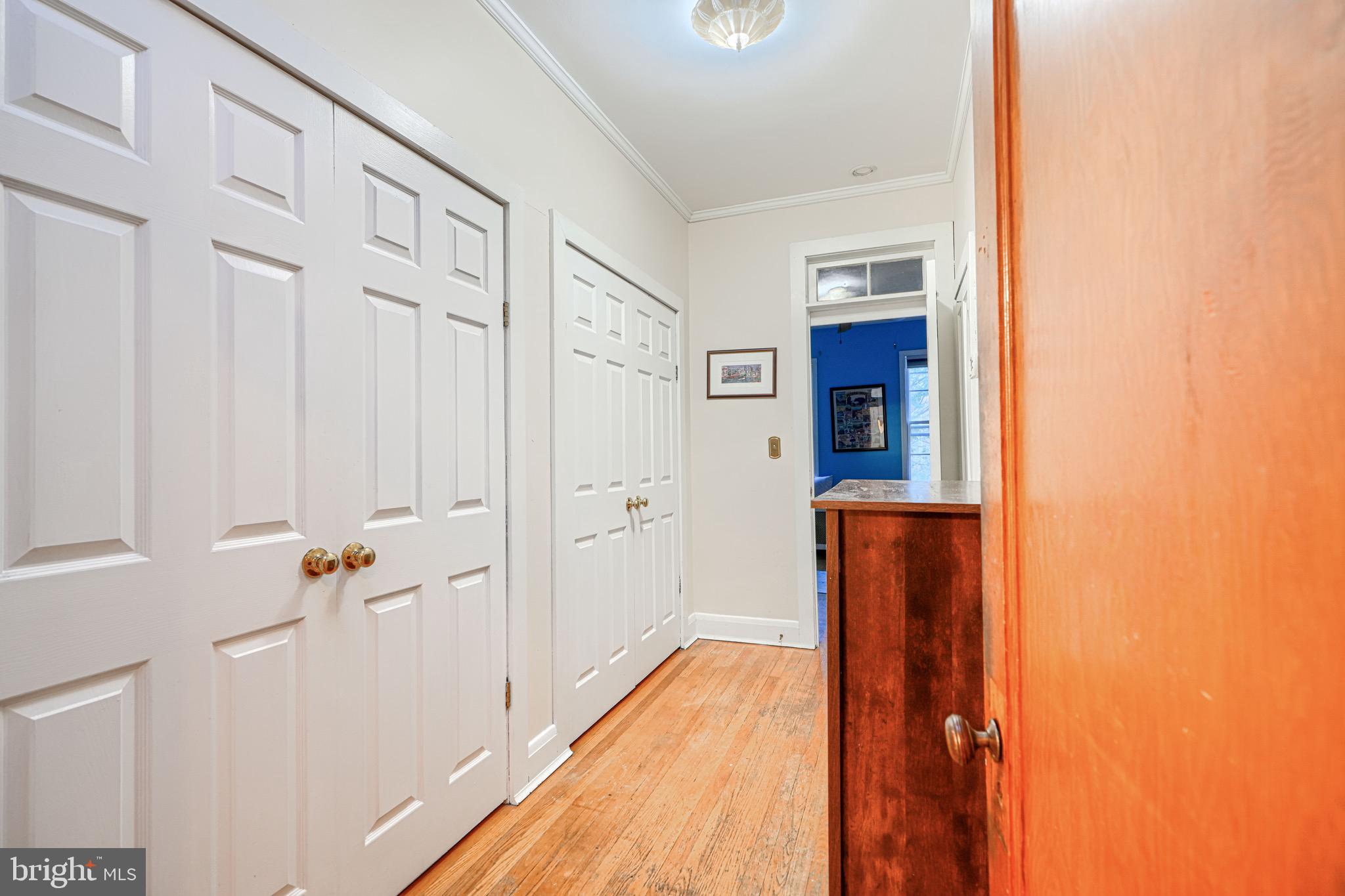 512 South Curley Street Baltimore, MD 21224 - Photo 22 of 29 a view of a hallway with wooden floor and staircase