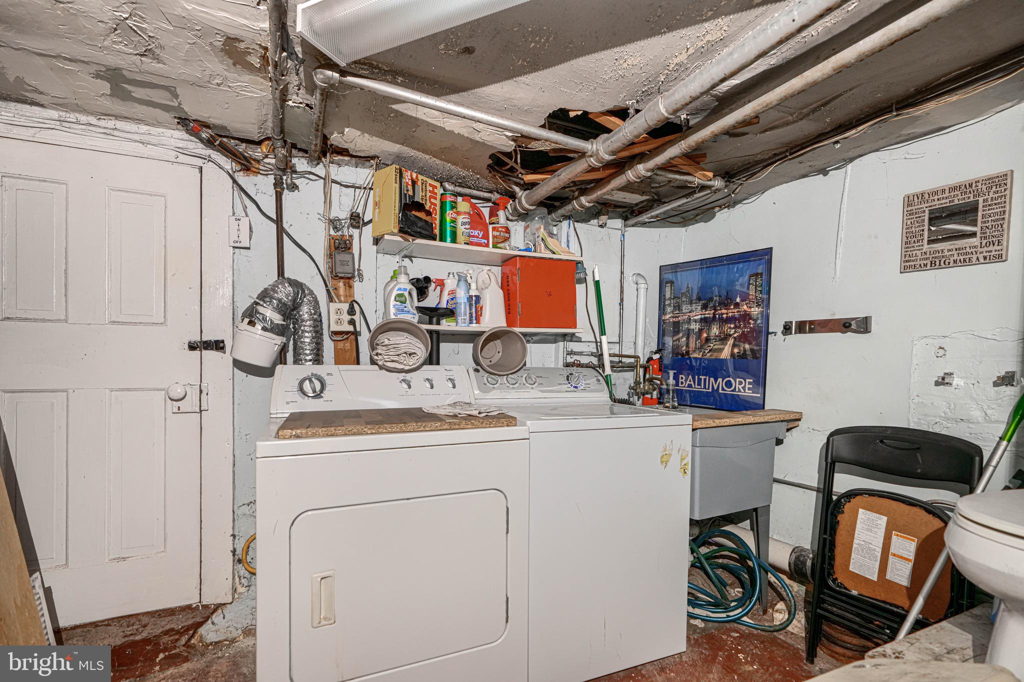 512 South Curley Street Baltimore, MD 21224 - Photo 29 of 29 a utility room with dryer and washer
