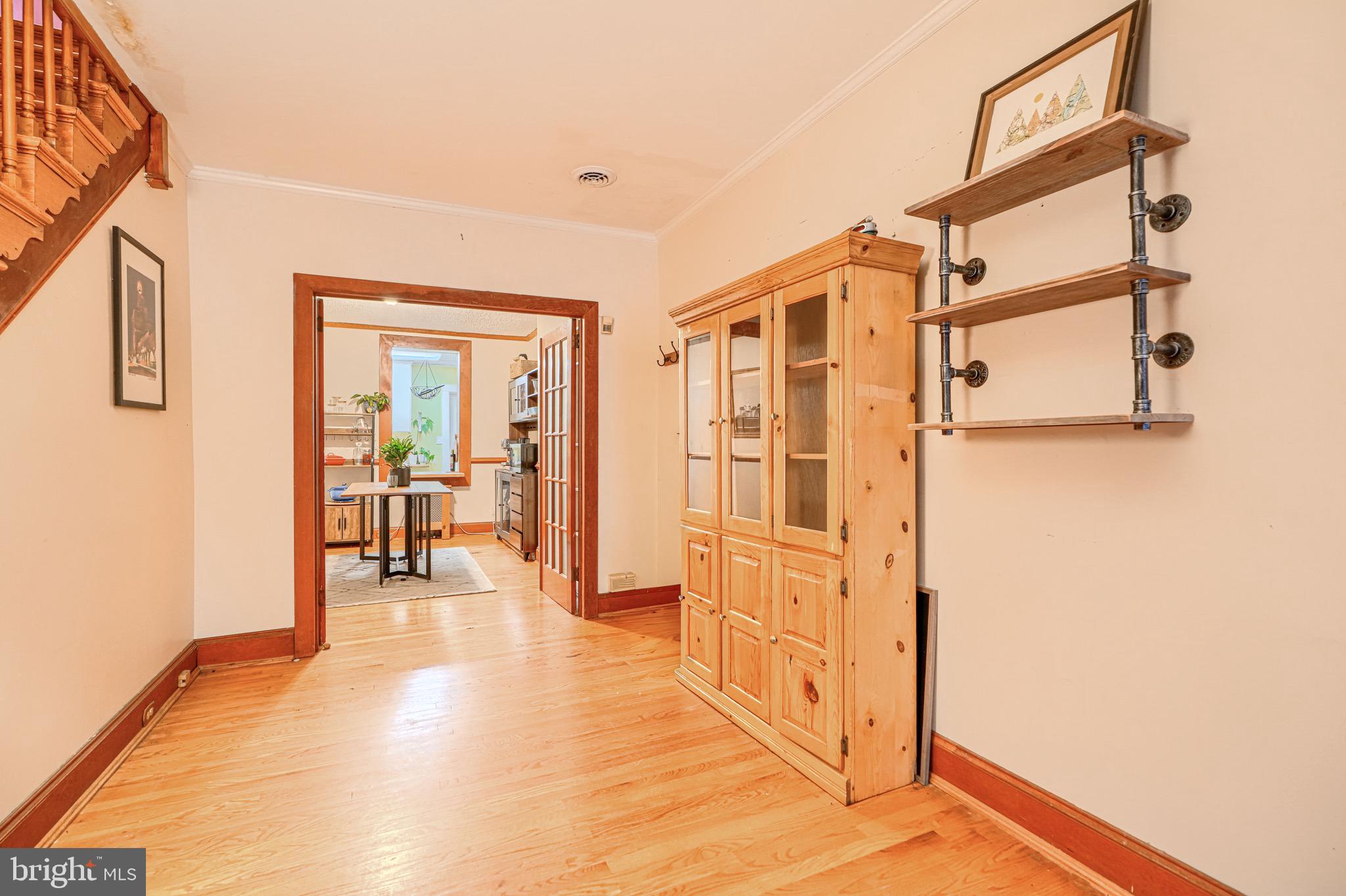 512 South Curley Street Baltimore, MD 21224 - Photo 9 of 29 a view of front door with wooden floor