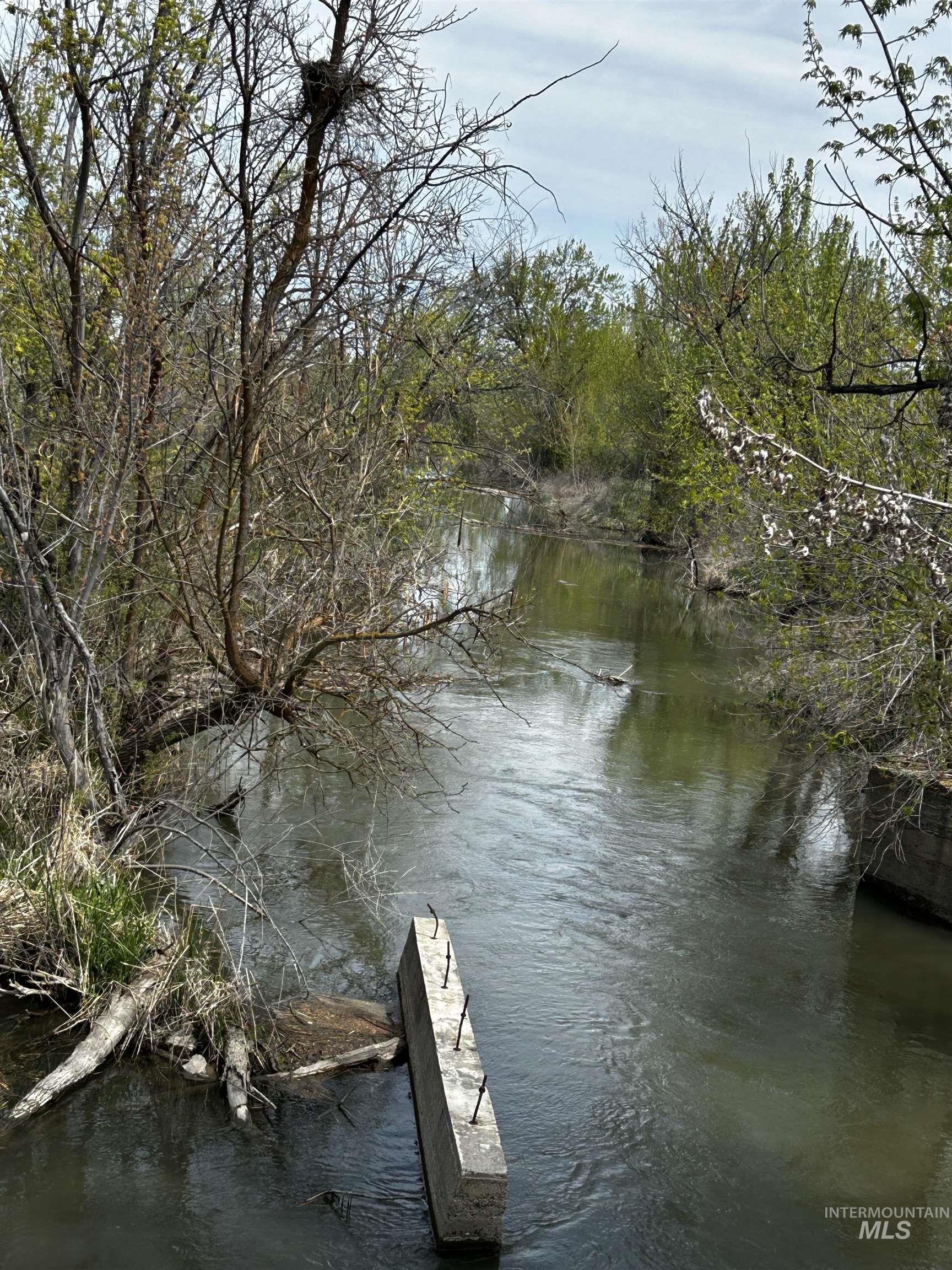 Tbd Airport Road Weiser, ID 83672 - Photo 5 of 5 Dock area with a water view and a wooded view