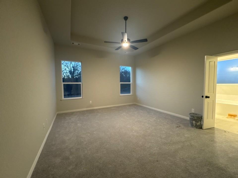 9007 County Road 623 Blue Ridge, TX 75424 - Photo 8 of 13 an empty room with windows and fan