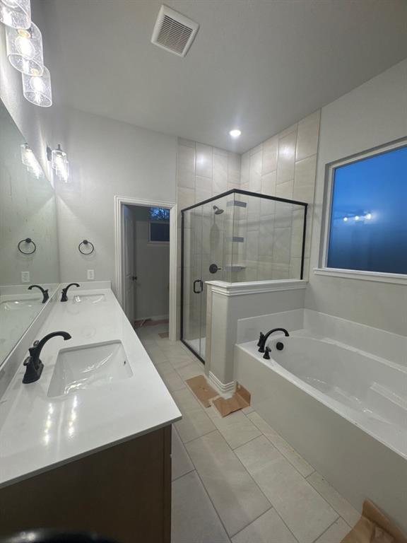 9007 County Road 623 Blue Ridge, TX 75424 - Photo 9 of 13 a spacious bathroom with a tub sink and mirror