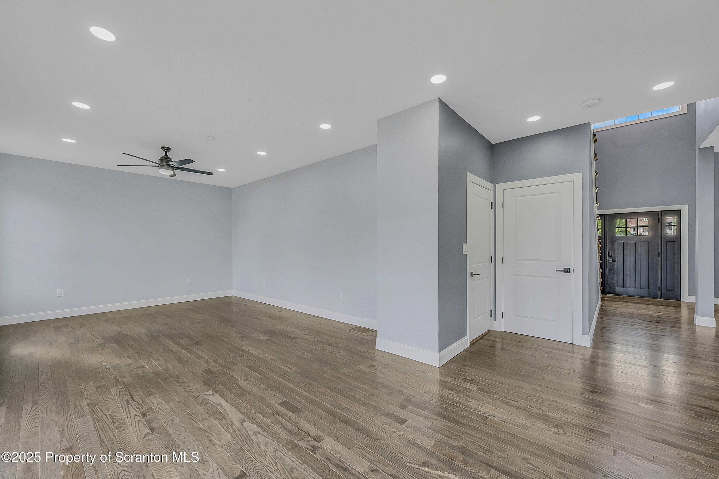 11 Riverview Drive Jessup, PA 18434 - Photo 11 of 58 a view of an empty room with wooden floor