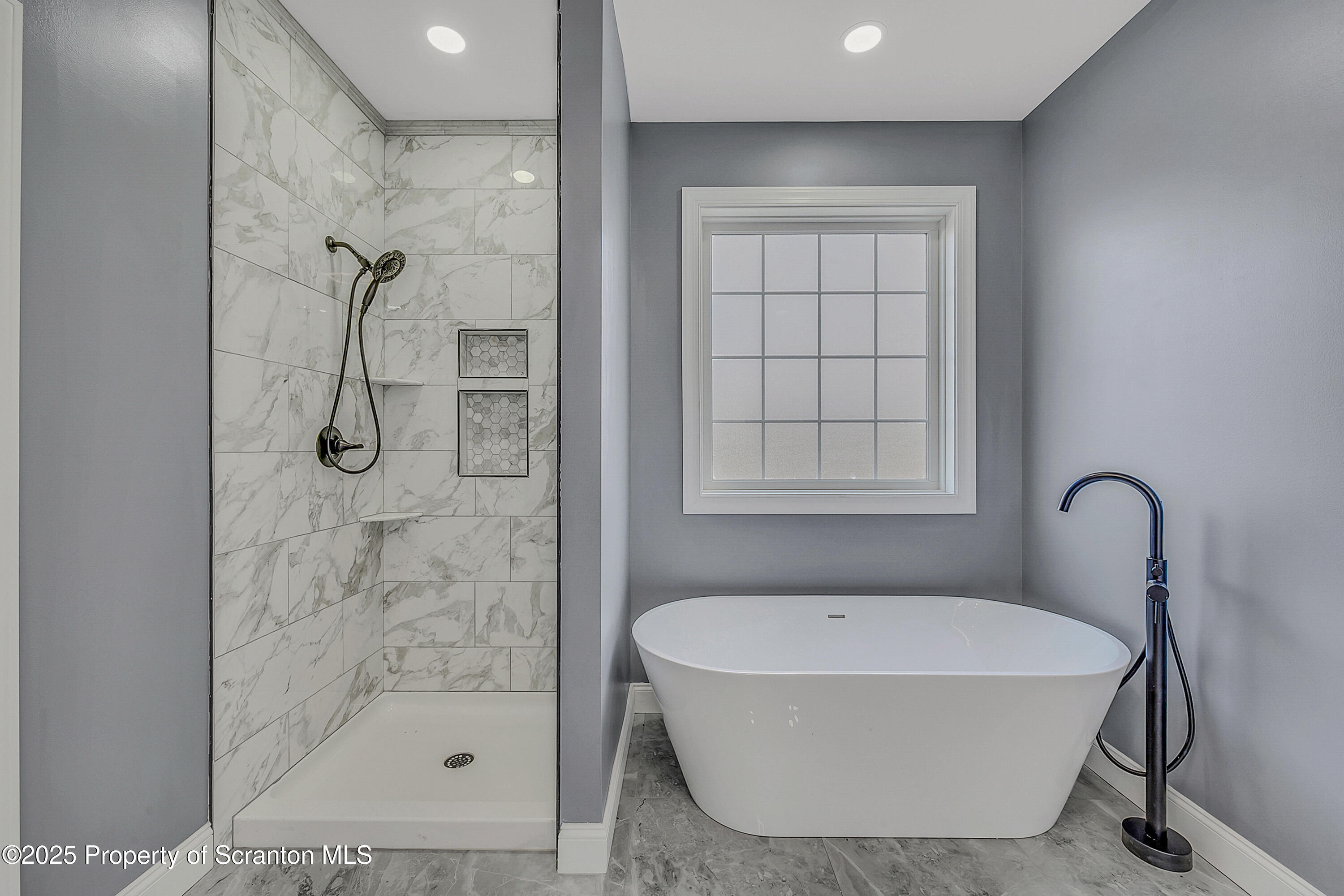 11 Riverview Drive Jessup, PA 18434 - Photo 34 of 58 a bathroom with a tub shower and a sink