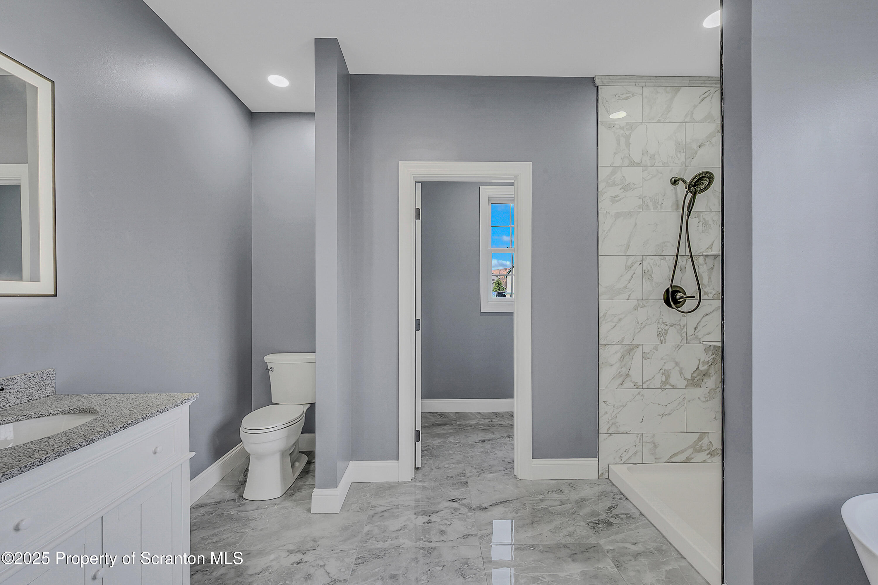 11 Riverview Drive Jessup, PA 18434 - Photo 36 of 58 a bathroom with a granite countertop sink a toilet and shower