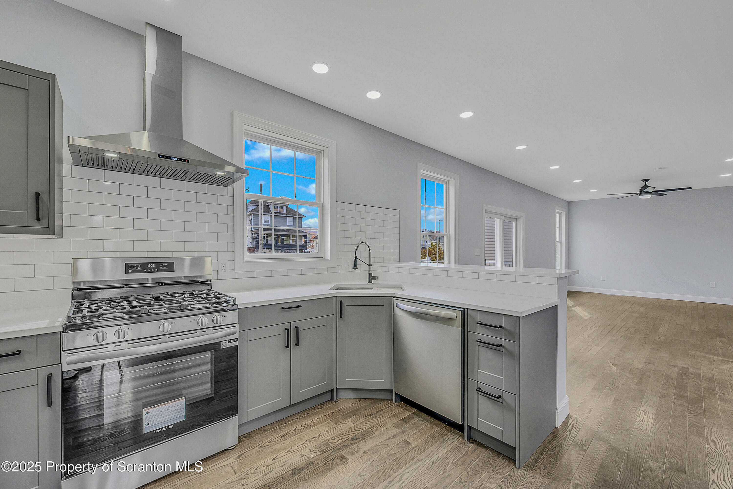 11 Riverview Drive Jessup, PA 18434 - Photo 4 of 58 a kitchen with a sink stove and cabinets