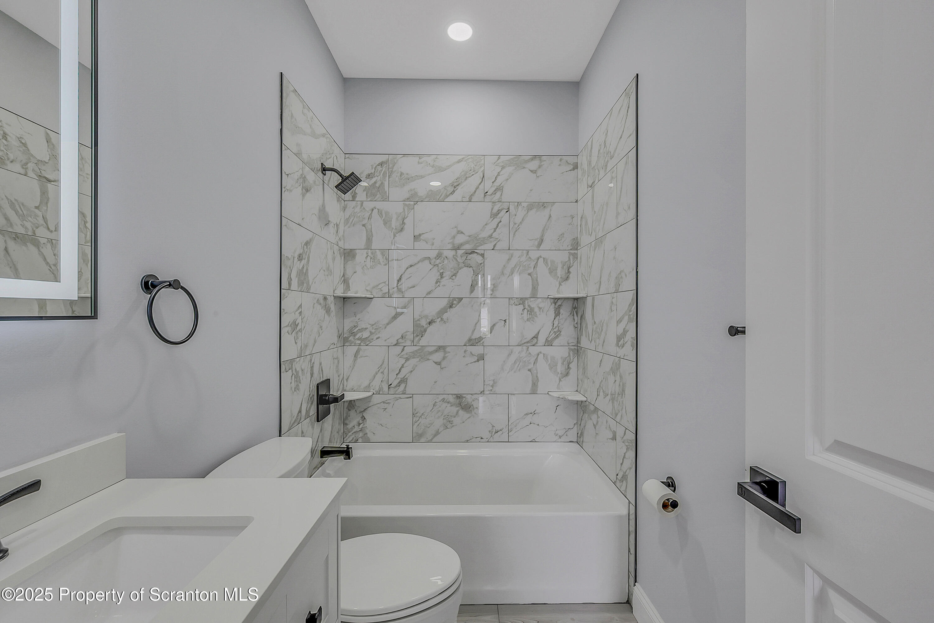 11 Riverview Drive Jessup, PA 18434 - Photo 49 of 58 a bathroom with a toilet and shower