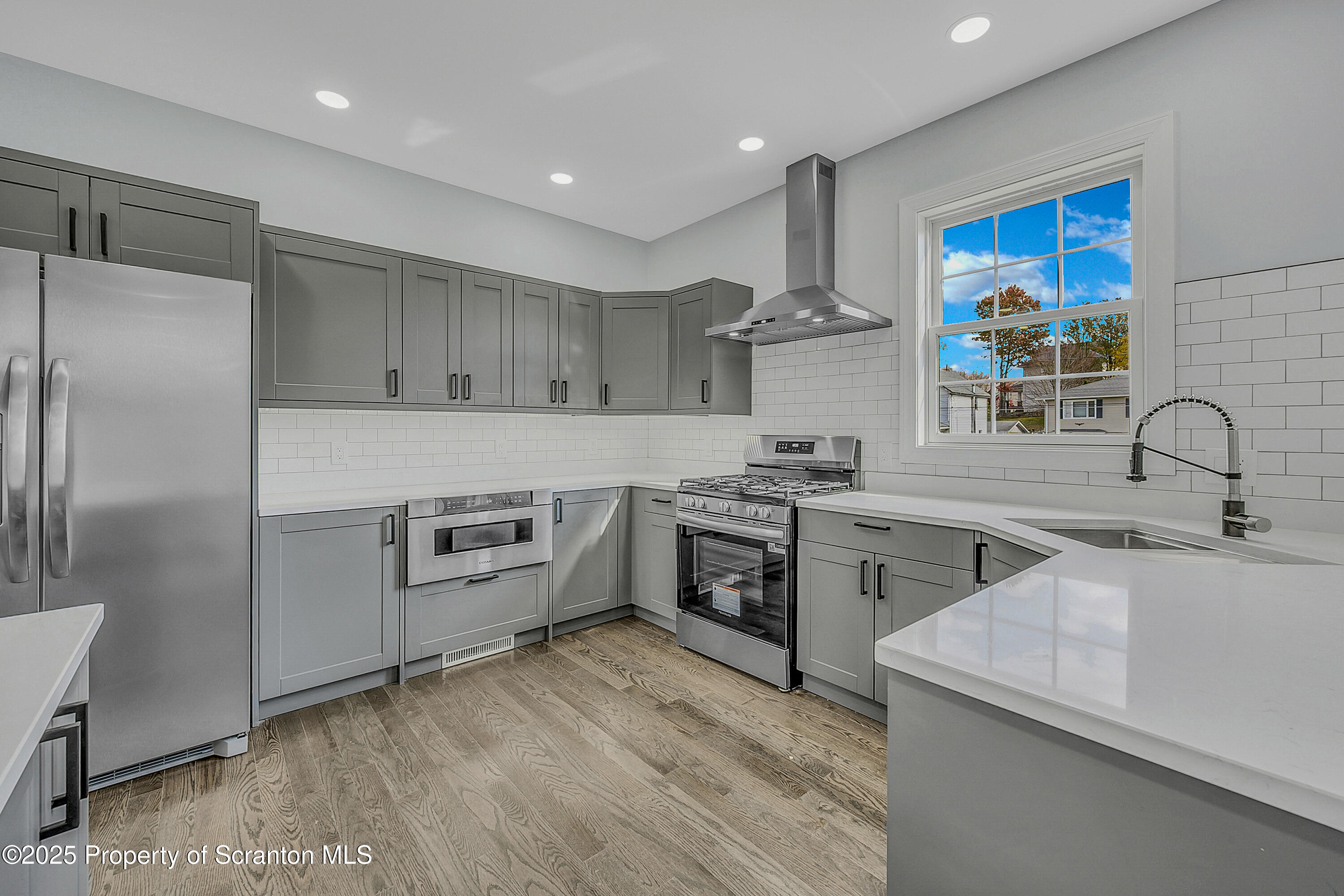 11 Riverview Drive Jessup, PA 18434 - Photo 5 of 58 a kitchen with a sink stainless steel appliances and cabinets