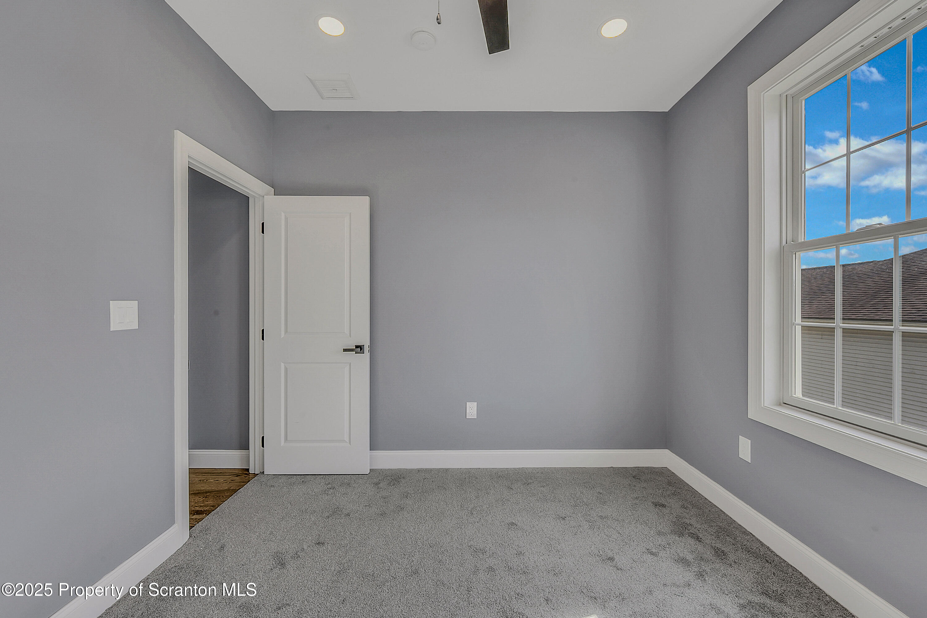 11 Riverview Drive Jessup, PA 18434 - Photo 51 of 58 an empty room with windows and closet