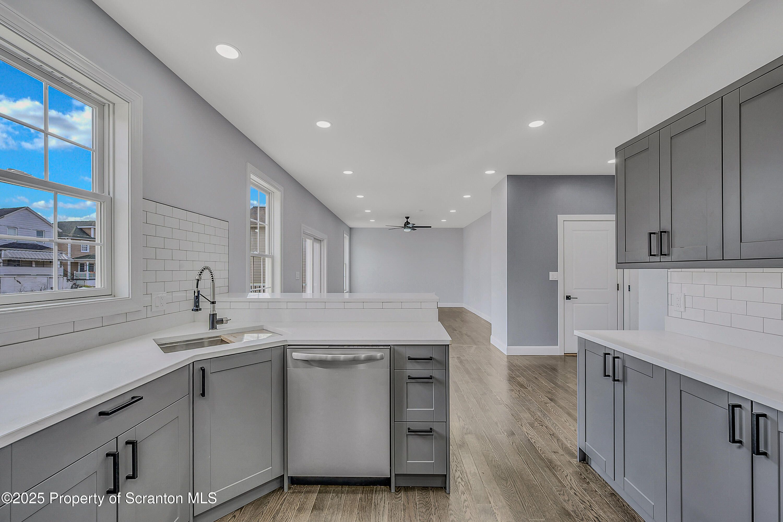 11 Riverview Drive Jessup, PA 18434 - Photo 7 of 58 a kitchen with a sink stainless steel appliances and cabinets