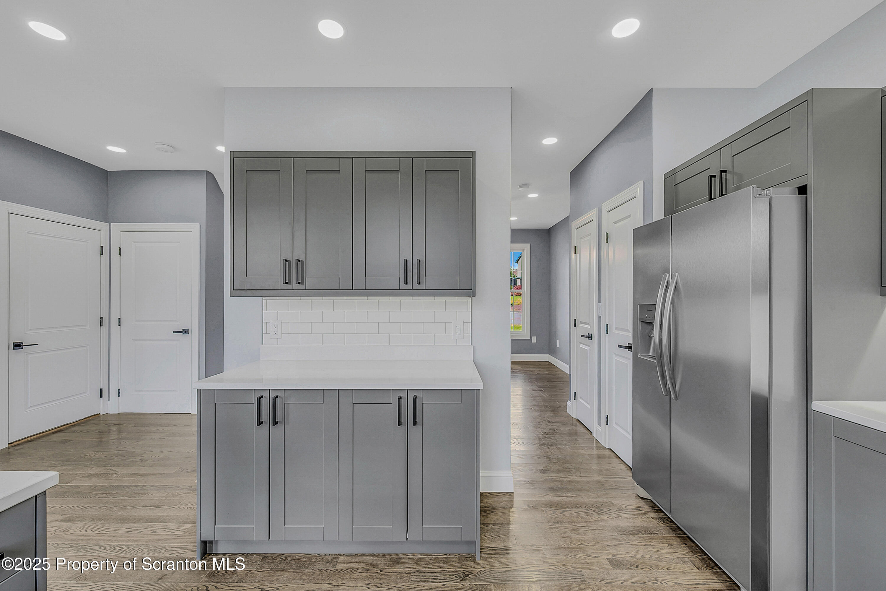 11 Riverview Drive Jessup, PA 18434 - Photo 9 of 58 a kitchen with stainless steel appliances granite countertop a refrigerator and a sink