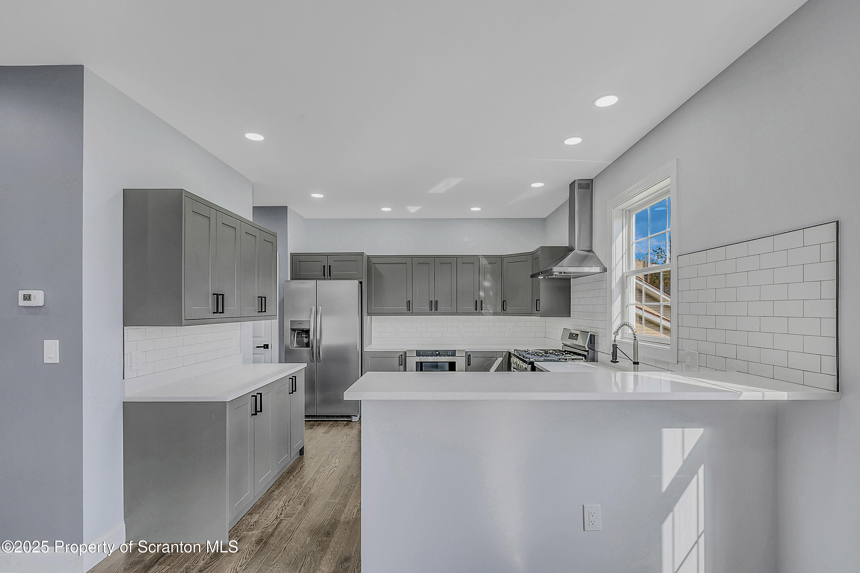 11 Riverview Drive Jessup, PA 18434 - Photo 10 of 58 a kitchen with stainless steel appliances granite countertop a sink and cabinets